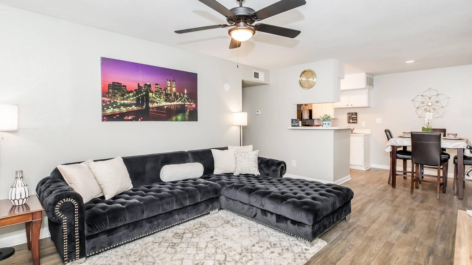 a living room filled with furniture and a fireplace